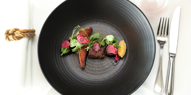 Roast duck breast, confit duck leg with pink peppercorn crust, kumara mash, beetroot.