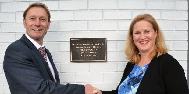 Principal Jim Luders and Ms Upston share a moment that was a long time coming.