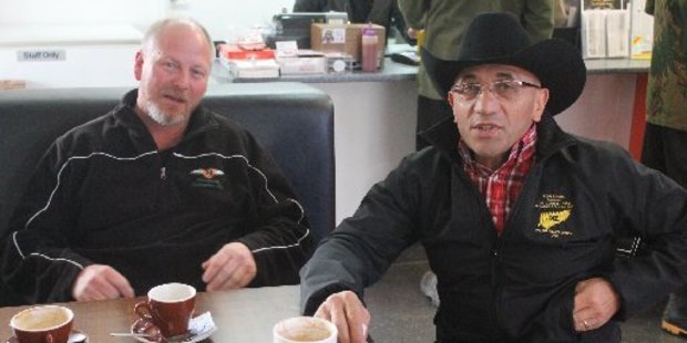 New Zealand First Deputy Leader Ron Mark talks with Nigel James of Woodville Transport in the Wind Farm Café about increasing operating costs.