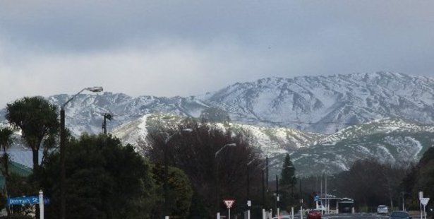 The Puketoi Ranges east of Dannevirke covered in a thick dumping of snow last Thursday afternoon. Photo / Christine McKay