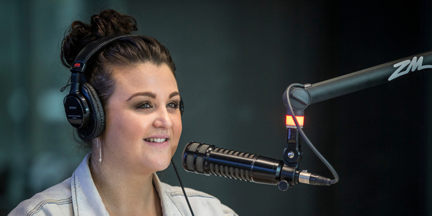 Megan Sellers at work during a ZM morning radio show. Photo/Michael Craig