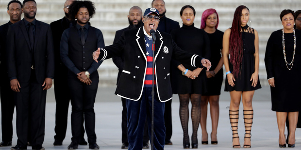 Singer Sam Moore performs during a pre-Inaugural "Make America Great Again! Welcome Celebration" at the Lincoln Memorial in Washington, Thursday, Jan. 19, 2017. (AP Photo/David J. Phillip)