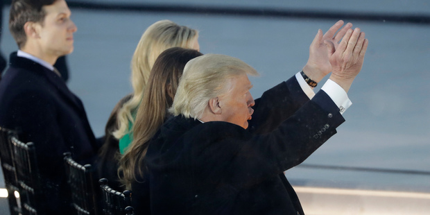 President-elect Donald Trump claps as he listens to music at a pre-Inaugural "Make America Great Again! Welcome Celebration" at the Lincoln Memorial in Washington, Thursday, Jan. 19, 2017. (