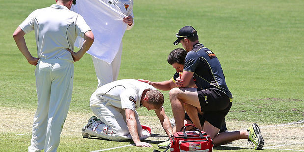 Adam Voges receives treatment after being struck in the head by a bouncer. Photo / Getty Images