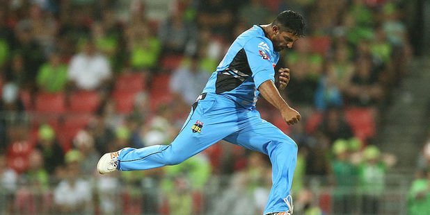 Ish Sodhi of the Strikers celebrates taking the wicket of Ben Rohrer of the Thunder. Photo / Getty
