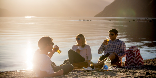 Govino products in use on the shores of Lake Wanaka. Photo / Camilla Rutherford Photography