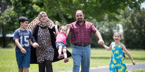 Fahad Zaid, 10, (left) Wagha Abdulraheem Al-Salihi, 33, Layan Zaid, 2, Zaid Al-Jarrah, 43, and Nisreen Zaid, 7, safely in New Zealand. Photo / Jason Oxenham