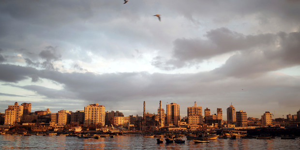 The sun sets over Gaza City. Photo / AP