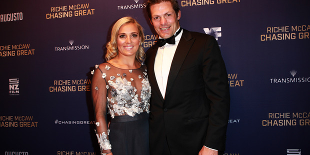 Loading It's supply and demand and if there wasn't the hunger for McCaw wedding pics there wouldn't be the ducking and diving behind umbrellas, writes Bernadine Oliver-Kerby. Photo / Norrie Montgomery