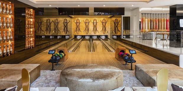 A private bowling alley with custom-made furnishings. Photo / Bruce Makowsky/BAM Luxury Development