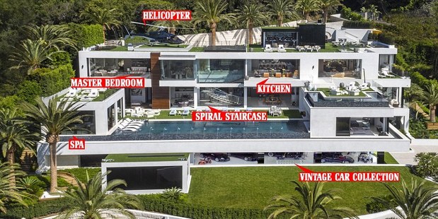 The house has a vintage car collection, a spa and a helicopter pad. Photo / Bruce Makowsky/BAM Luxury Development