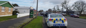 Police attend a robbery at Queen Street Foodmarket in Levin.