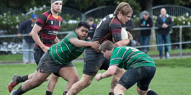 Vaughan McCardle drives the ball forward. Photo: Sally Osborn.