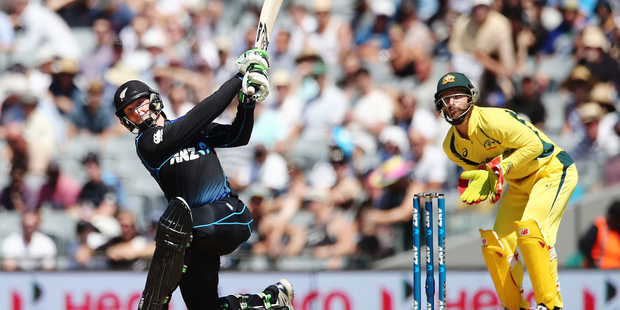 Martin Guptill of New Zealand hits a six. ANZ International Series, 1st ODI between New Zealand Back Caps and Australia. Photo / Anthony Au-Yeung