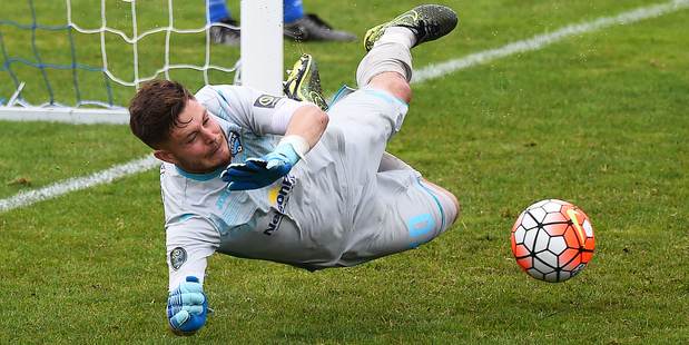 Tasman goal keeper Tom Fawdry saves the potential match-winning penalty. Photo / Photosport