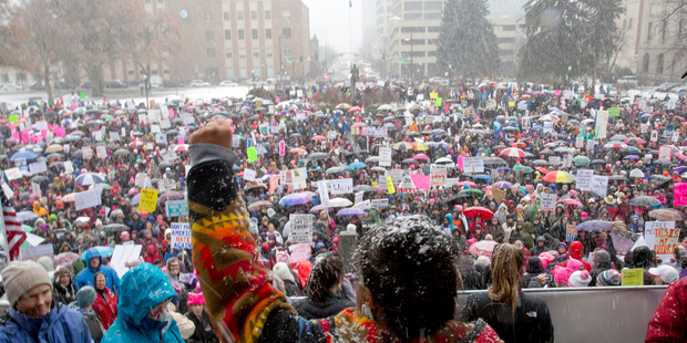 Tai Simpson from the Nez Perce Tribe in Lapwai, Idaho speaks as supporters gather at the steps if the Idaho Statehouse for the Women's March in Boise.