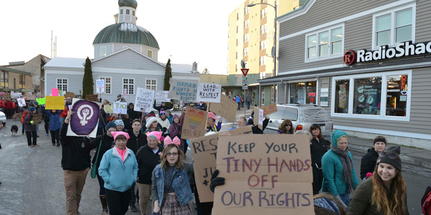 Hundreds of people march in downtown Sitka, Alaska, during the women's march.