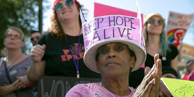 Tracy Williams, 76, from Austin, created her personalised hat to wear for the women's march in Austin, Texas.