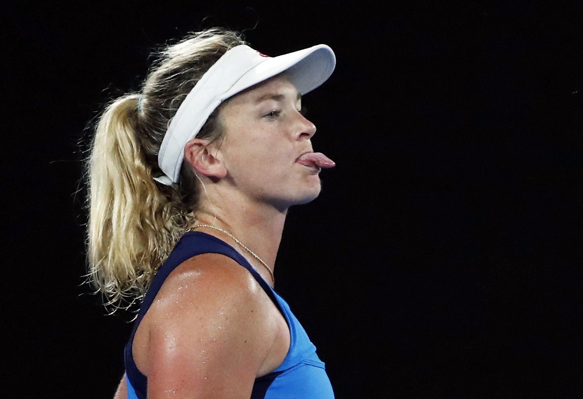 Coco Vandeweghe sticks her tongue out while playing against Germany's Angelique Kerber. Photo / AP