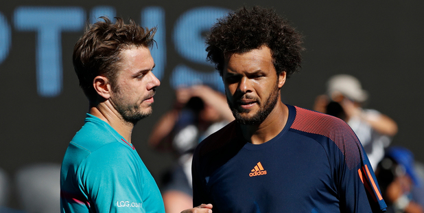 Switzerland's Stan Wawrinka, left, is congratulated by France's Jo-Wilfried Tsonga after winning their quarterfinal at the Australian Open. Photo / AP