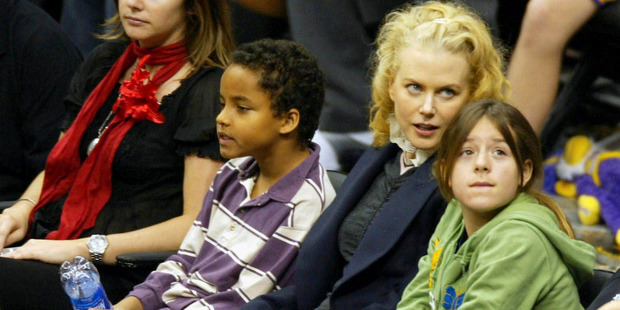 Nicole Kidman and her oldest children Connor and Isabella at a basketball game in 2004. Photo / Getty