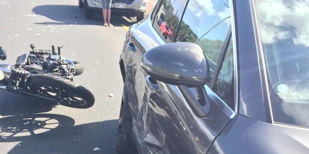 Cadena Silva's Harley-Davidson alongside Buchanan's Porsche, both were damaged in the crash. Photo / Supplied