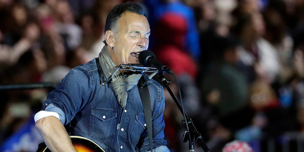 Bruce Springsteen performs during a Hillary Clinton campaign. Photo / Matt Slocum/AP