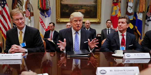 From left: Wendell P. Weeks, CEO of Corning, President Donald Trump and Alex Gorsky Chairman and CEO of Johnson & Johnson. Photo / AP