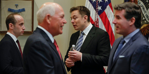 From left, White House Senior Adviser for policy Stephen Miller, Jeff Fettig, CEO of Whirlpool, Elon Musk, CEO of SpaceX and Kevin Plank, founder of Under Armour at the White House. Photo / AP