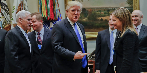 Chris Liddell, far right, was with Donald Trump when he met GM CEO Mary Barra this week. Photo / AP