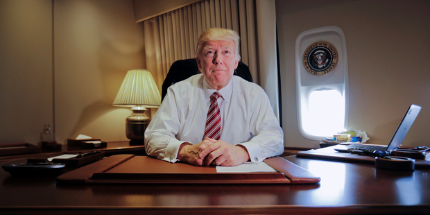 President Donald Trump sits at his desk. Photo / AP