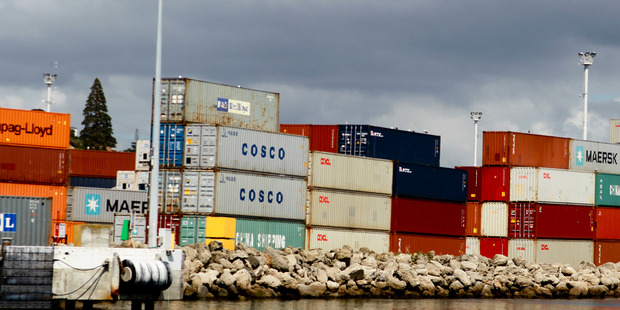 A container from a stack, like this one, was struck by a train after it blew on to the main trunk rail line at Otahuhu in Saturday's storm. Photo / File