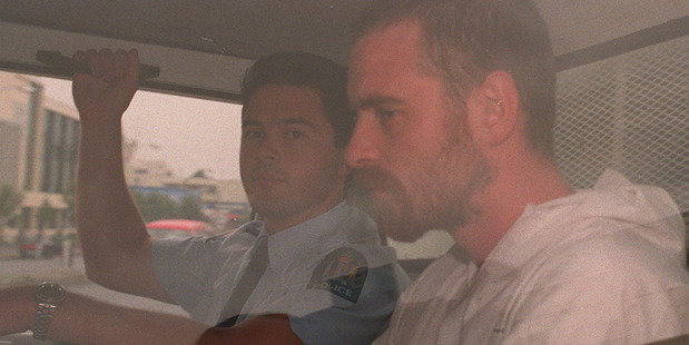 ON REMAND : Stephen Anderson is driven from the Hamilton District Court in a police van yesterday. Stephen Lawrence Anderson, facing 15 charges relating to the Raurimu shootings on Saturday. 12 Februa