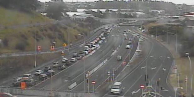 Emergency services are at the scene of a crash on Auckland's Southwestern Motorway early this evening. Photo / via NZTA
