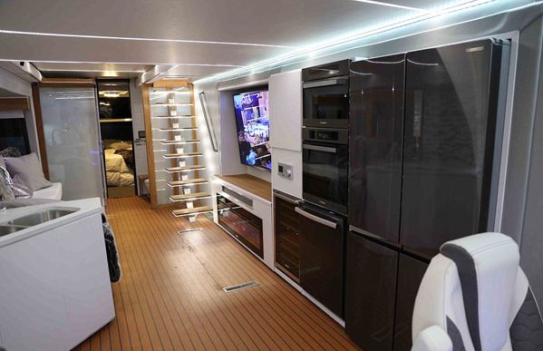 The interior of the stunning RV (pictured) is better-equipped than most people's apartments. Photo / Furrion