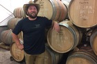 Winemaker Joel Watson say the oak barrels the wines are aged in are imported from France and cost $1-2k each. Photo/Melissa Nightingale