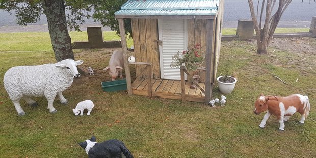 Dianne Green's lamb, piglet, sheep dog, and Billy the sheep were all stolen from her front lawn. Photo / Supplied