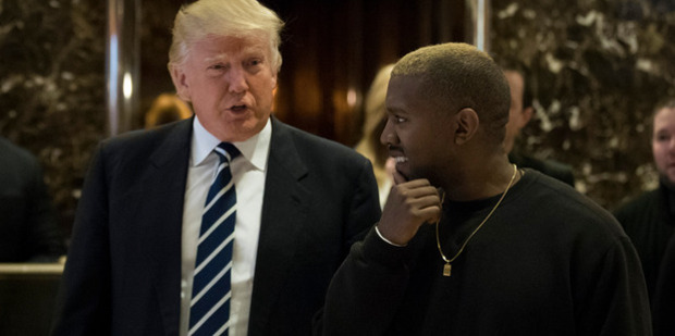 President Donald Trump and Kanye West walk into the lobby at Trump Tower, December 13, 2016 in New York City. Photo / Getty