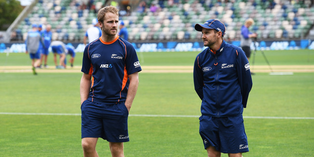 NZ Captain Kane Williamson and coach Mike Hesson inspect the wicket during a rain delay. International One Day Cricket. Photo / Photosport.co.nz