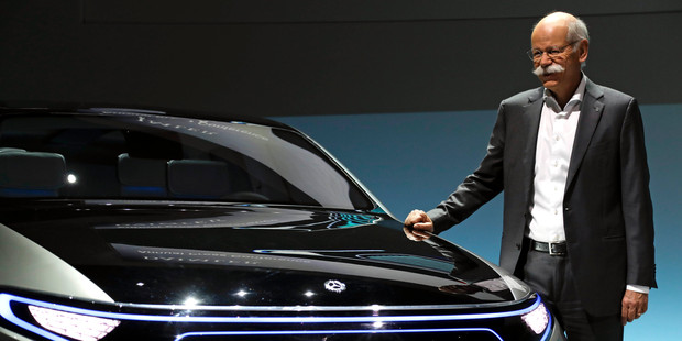 CEO of the Daimler AG Dieter Zetsche poses for photographers at the company's headquarters in Stuttgart, Germany. Photo / AP