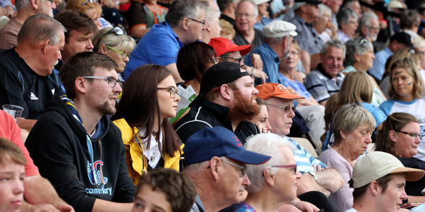 A disappointed crowd at Mclean Park as the weather stymied any chance of play. Picture / Duncan Brown