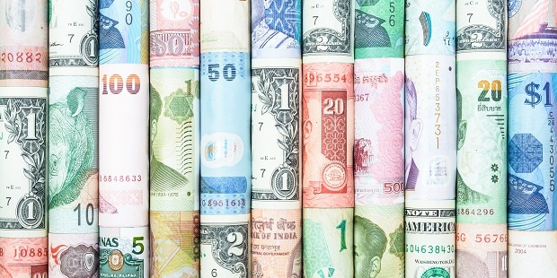 ATMs are a good way to get your cash overseas, but be careful of skimming. Photo / 123RF