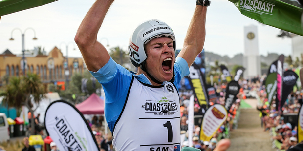 Sam Clark of Whakatane celebrates after winning the longest day title. Photo / photosport.nz