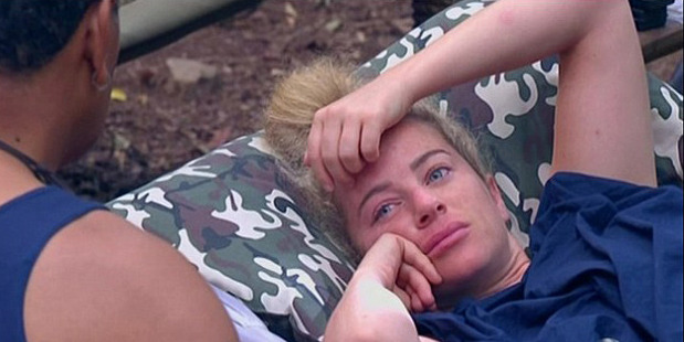 Surprised! A nearby Ash Pollard tried to suppress her sniggers at the unexpected outburst. Photo / Channel Ten