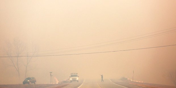 A bushfire in Cleveland, Oklahoma. Republican statesmen propose a carbon tax to battle climate change. Photo / AP