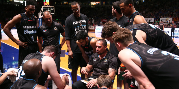 Paul Henare, coach of the NZ Breakers, speaks to his team during the NBL match against the Adelaide 36ers. Photo/Getty Images