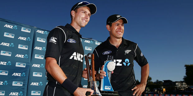 Trent Boult and Ross Taylor of New Zealand celebrate with the Chappell-Hadlee Trophy and ANZ Series Trophy. Photo / Getty