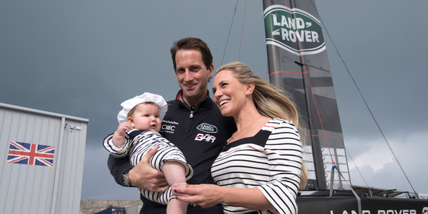 Sir Ben Ainslie, skipper of LandRover BAR, Lady Georgie Ainslie and their daughter Bellatrix pose during the launch and naming of the new Land Rover BAR R1 race yacht. Photo/Getty Images
