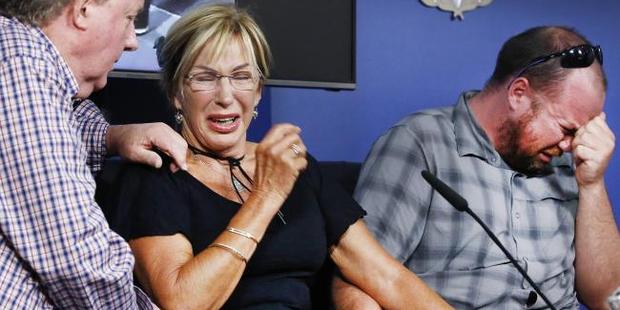 David Dick's uncle John Hird, left, mother Carol Cloke, and brother Simon Dick break down in tears as they describe the shock of their loss. Photo / News Corp