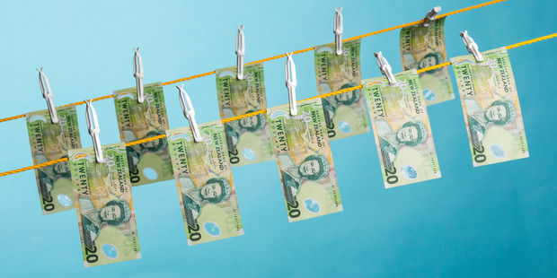 Twelve financial entities have been given an official warning for breaching anti-money laundering law. Photo/Greg Bowker.